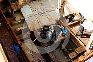 Dye reservoirs in tannery in Fes, Morocco, where the world famous moroccan leather is made