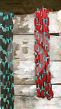 Dyed ikat thread hanging to dry photo