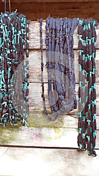 Dyed ikat thread hanging to dry photo