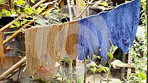 Dyed thread hanging to dry photo