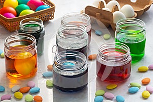 Dyeing Easter Eggs in Glass Jars with Colorful Easter Candy