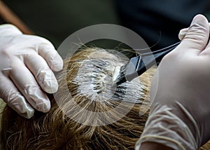 Dyeing gray hair.