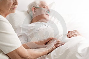 Dying senior man and his wife