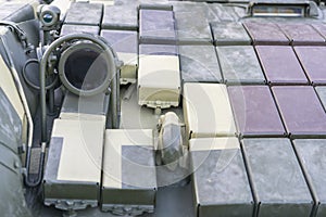 Dynamic armored tank. Tower and the front part of the tank with dynamic protection and optical devices. on a white backgr