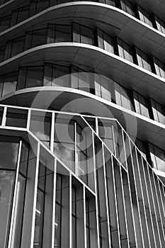 Dynamic black and white shot of modern architecture with striking geometric patterns and contrasting shapes