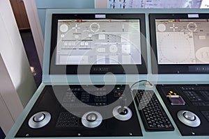 Dynamic position control panel on ship tanker.