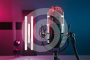 Dynamic presentation, studio microphone with neon lights, modern aesthetics