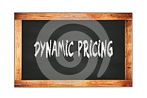 DYNAMIC  PRICING text written on wooden frame school blackboard