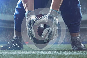 Dynamic shot of football player gearing up for intense match