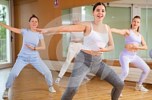 Dynamic young woman dancing hip-hop