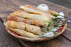 Dynamite lumpia or dinamita, a popular Filipino appetizer usually stuffed with cheese or ground beef or pork photo