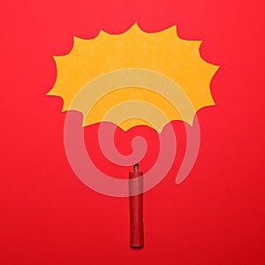 Dynamite stick with empty yellow cloud sign above on red background - Explosion concept - Minimal design