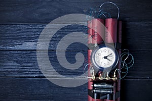 Dynamite time bomb on a blue texture background