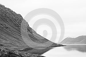 Dynjandi waterfall area mountain and fjord