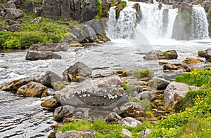 Dynjandi waterfall Iceland with rocky stream