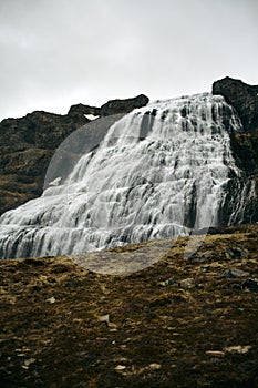 Dynjandi waterfall in the westfjords of Iceland. Iceland`s largest waterfall, located in the mountains. nobody around.