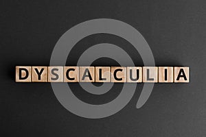 Dyscalculia - word from wooden blocks with letters