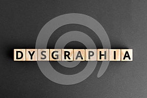 Dysgraphia - word from wooden blocks with letters