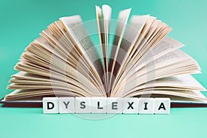 Dyslexia and read words with an open book photo