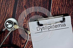 Dyslipidemia text write on a paperwork isolated on office desk. Healthcare/Medical concept