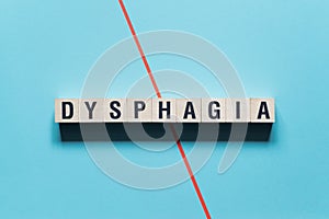 Dysphagia word concept on cubes