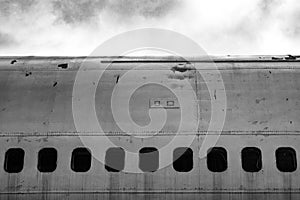 Cabin windows on an old abandoned jet plane / aircraft