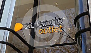 View on logo lettering of Zalando outlet store over shop entrance