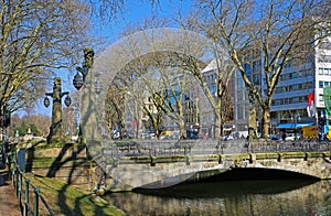 View on river DÃÂ¼ssel with bridge at famous shopping street on sunny winter day