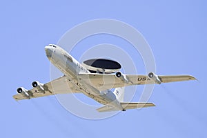 E3 Awacs plane flying above air force base