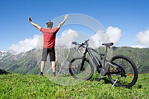 E Bike Mountain Bicycle In Austria. Excited Man photo