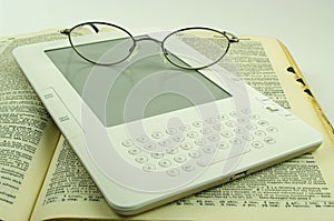 E book spectacles and old paper book