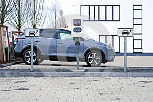 e-car charging station, electric vehicle supply equipment (EVSE) information sign electric car charge point, parking