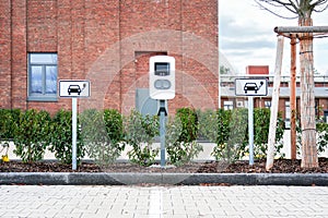 e-car charging station, electric vehicle supply equipment (EVSE) information sign electric car charge point, parking