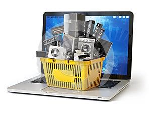 E-commerce online shopping or delivery concept. Home appliance in shopping cart on the laptop keyboard isolated on white. 3d