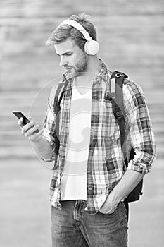 E learning. College student headphones smartphone. Online learning. Audio book concept. Educational technology use of