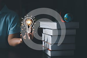 E-learning education internet technology webinar online courses concept. Hand holding lightbulb sh, education icons. Internet