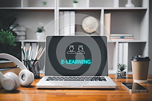 E-learning and online education for student and university concept. Laptop with inscription on screen e-learning, technology to