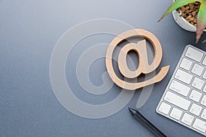 E-mail address sign on the desk photo