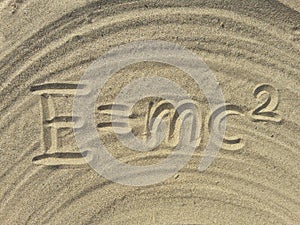 E mc2 write on the sand photo