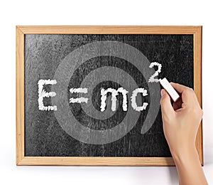 E=mc2 on blank blackboard
