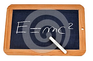 E = MC2 written on a school slate