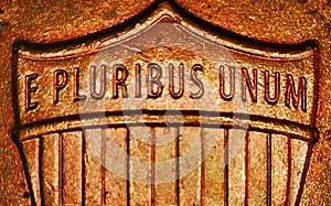 E Pluribus Unum on copper shield. macro photo of the back of a penny