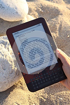 E-Reader being used on Beach