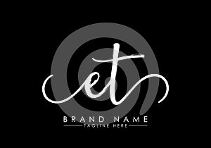 E T Initial handwriting logo vector, Handwriting logo design with Brush, Logo for fashion, team, wedding, luxury logo photo