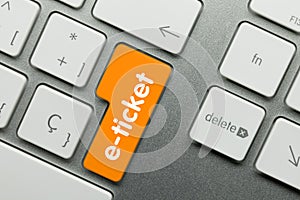 E-ticket - Inscription on Orange Keyboard Key