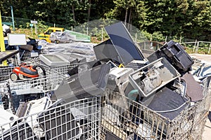 E waste disposed of in a recycling center, close up shot