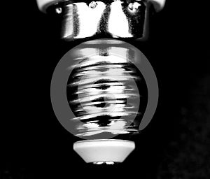 E14 Led bulb base on black background