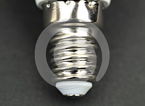 E14 Led bulb base on black background