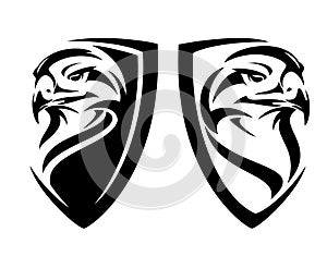 Eagle bird head in simple heraldic shield black and white vector emblem