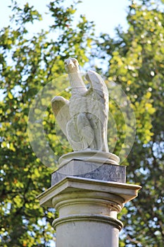 Eagle column gardening building in the Palace of Gatchina park. It is a four-sided tower on high pedestal, mounted small hill.